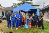 DWP Dinsos PPPA Lingga Salurkan Bantuan untuk Korban Banjir ROB | f. Hamka