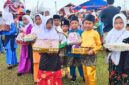 Ribuan Peserta Meriahkan Pawai Pembangunan HUT RI ke-80 di Kota Dabo Singkep | f. Cahyo