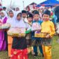 Ribuan Peserta Meriahkan Pawai Pembangunan HUT RI ke-80 di Kota Dabo Singkep | f. Cahyo