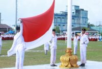 Hujan Membasahi, Semangat Tak Padam: Upacara HUT RI ke-80 di Dabo Singkep Penuh Haru dan Kebanggaan | f. Arnel