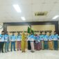Pelepasan atlet dan oficial Pemprov Kepri yang akan berlaga di PORNAS XVII KORPRI 2025 Sumatera Selatan. Pelepasan ditandai dengan penyerahan pataka oleh Kepala BKD Kepri kepada Rodi Yantari selaku Ketua Kontingen, Jumat (3/10/2025) | f. Diskominfo Kepri
