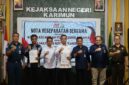 Kejari Karimun dan Koperasi Merah Putih Sungai Raya Teken Nota Kesepahaman: Wujud Nyata Dukung Pembangunan Ekonomi Desa | f. Kejati Kepri