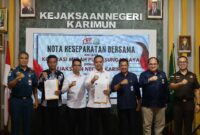 Kejari Karimun dan Koperasi Merah Putih Sungai Raya Teken Nota Kesepahaman: Wujud Nyata Dukung Pembangunan Ekonomi Desa | f. Kejati Kepri