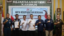 Kejari Karimun dan Koperasi Merah Putih Sungai Raya Teken Nota Kesepahaman: Wujud Nyata Dukung Pembangunan Ekonomi Desa | f. Kejati Kepri