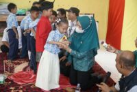 Ketua PKK Lingga Supervisi Posyandu ILP dan Serahkan APE untuk PAUD di Senayang | f. Diskominfo Lingga