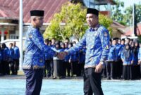Pemkab Lingga menggelar upacara Hari Otonomi Daerah ke-30. Wakil Bupati Novrizal tekankan pentingnya sinergi pusat dan daerah serta inovasi pembangunan | f. Diskominfo Lingga