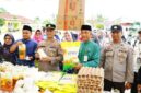 Pemkab Lingga melalui TPID menggelar pasar murah di Lapangan Hang Tuah Daik untuk menekan inflasi dan membantu masyarakat menghadapi kenaikan harga sembako menjelang Idul Adha 1447 H | Diskominfo Lingga